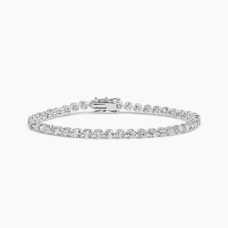 18ct white gold round brilliant cut LAB Grown Diamond tennis bracelet in a three claw setting
