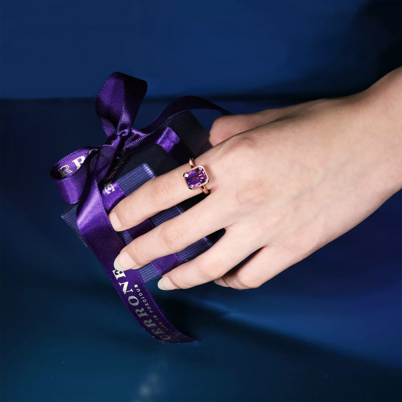 18ct rose gold emerald cut purple amethyst bezel set ring on the finger