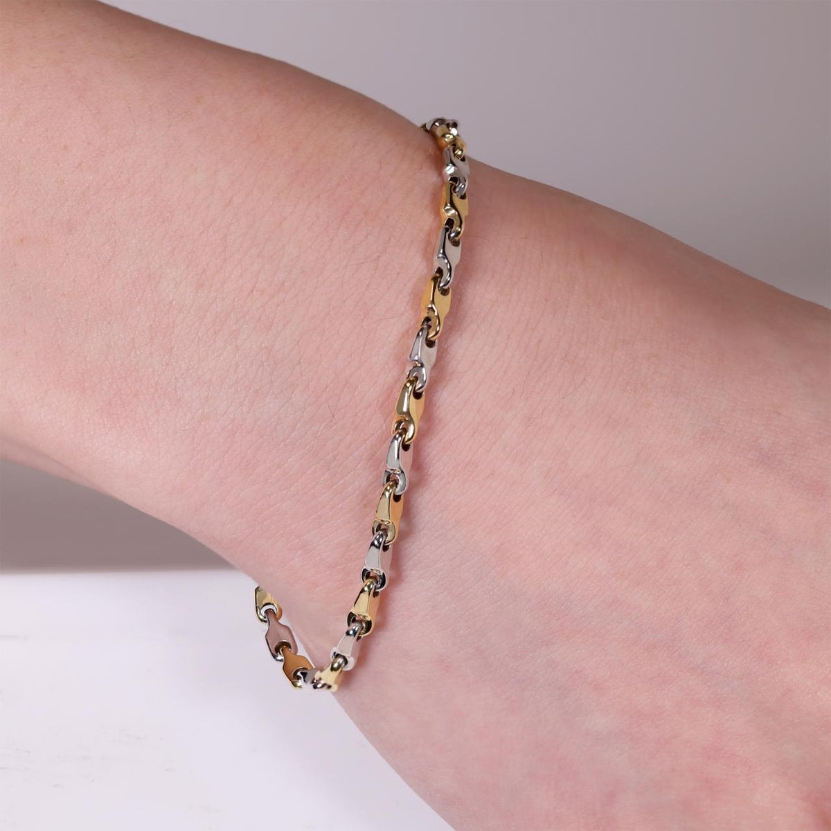 18ct white & yellow gold bracelet on the wrist