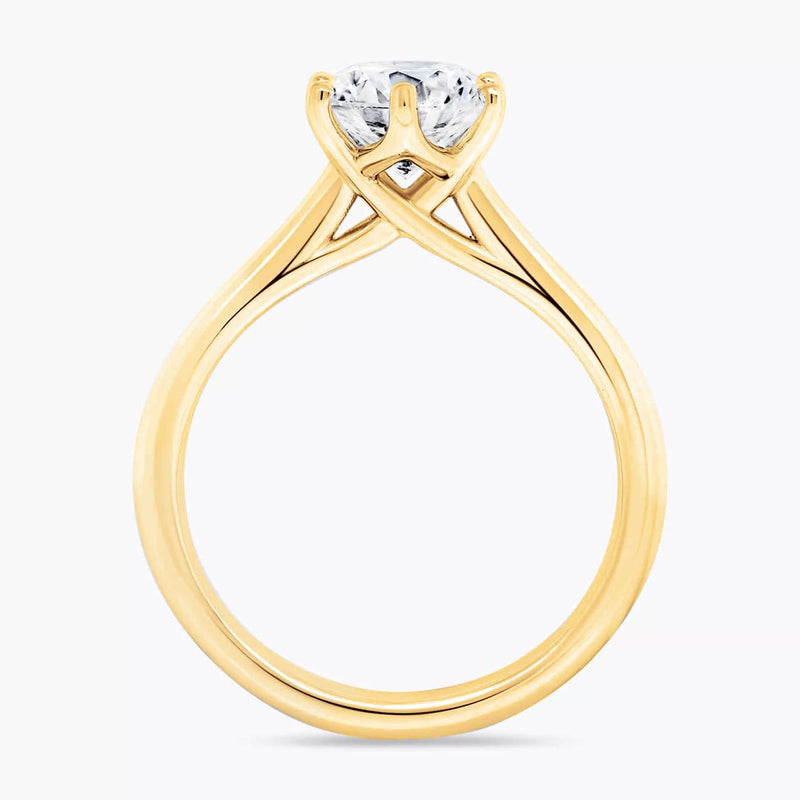 18ct yellow gold 1.01ct round brilliant cut lab grown diamond ring in six claw setting side profile