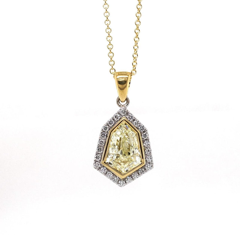 18ct white and yellow gold fancy light yellow kite shaped diamond halo pendant