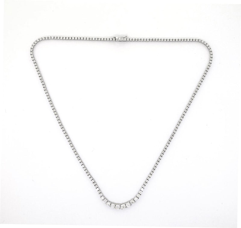 18ct white gold graduating round brilliant cut diamond tennis necklace in a four claw setting