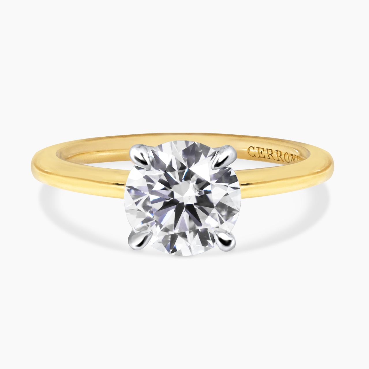 18ct yellow and white gold D SI2 round brilliant cut diamond four claw solitaire ring