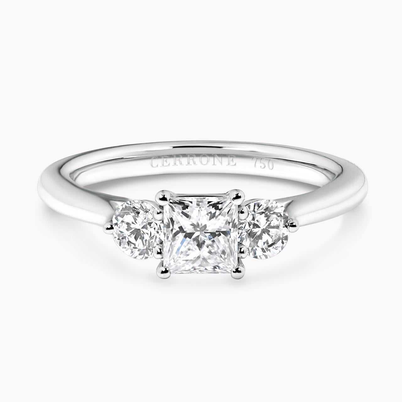 18ct white gold 0.54ct princess cut 2=0.36ct round brilliant cut diamonds claw set three stone ring