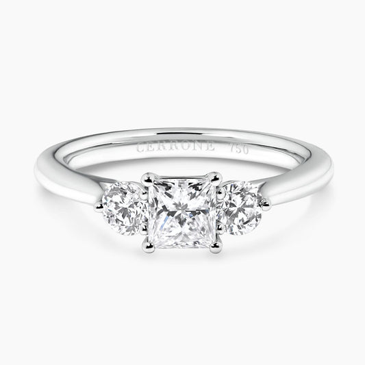 18ct white gold 0.54ct princess cut 2=0.36ct round brilliant cut diamonds claw set three stone ring