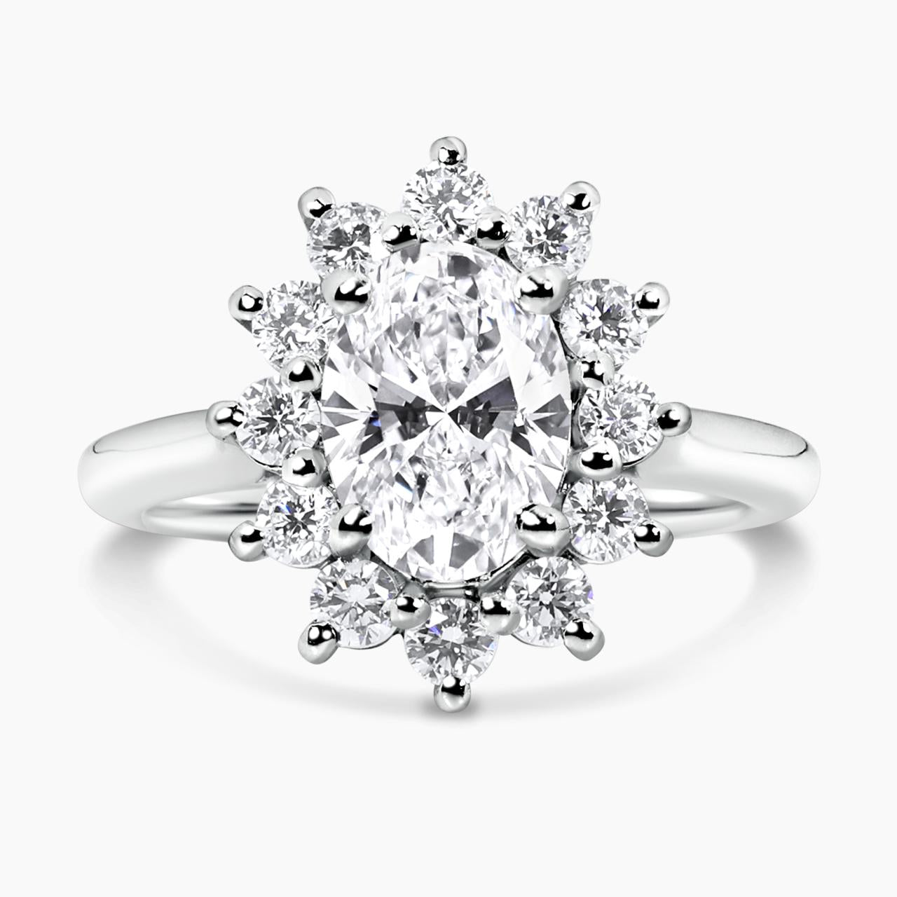 18ct white gold oval and round brilliant cut diamond halo ring