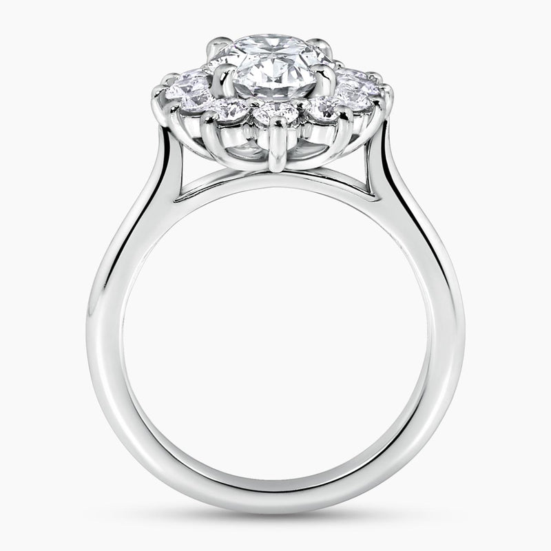 18ct white gold oval and round brilliant cut diamond halo ring side profile