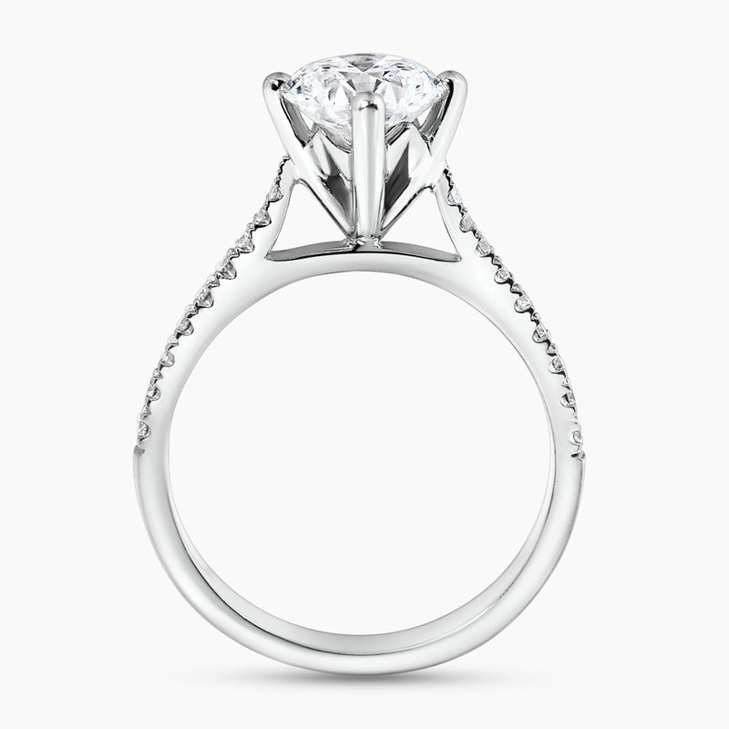 18ct white gold round brilliant cut diamond ring with diamond band side profile