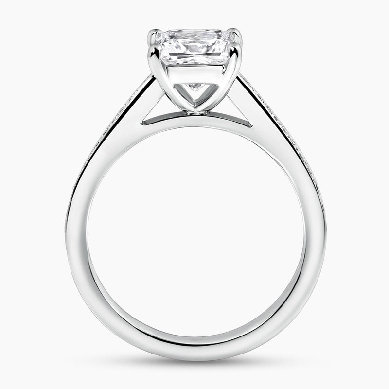 18ct white gold princess and round brilliant cut diamond ring