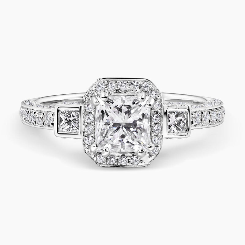 18ct white gold 1.00ct and 2=0.14ct princess cut diamond bezel set halo three stone engagement ring