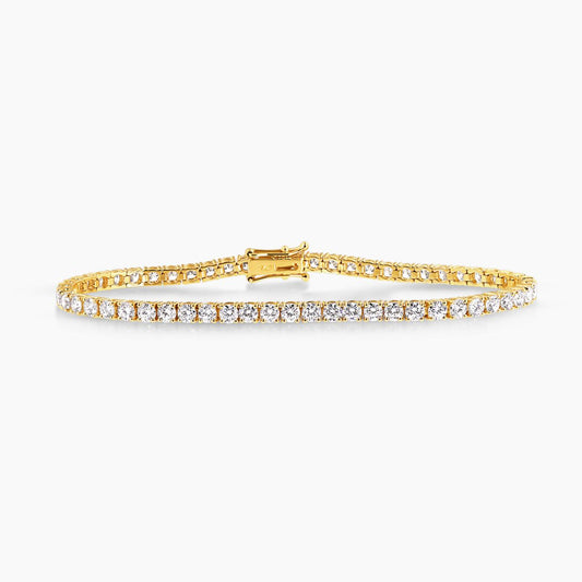 18ct yellow gold  57=5.78ct DEF VVS VS round brilliant cut lab grown diamonds tennis bracelet in a four claw setting