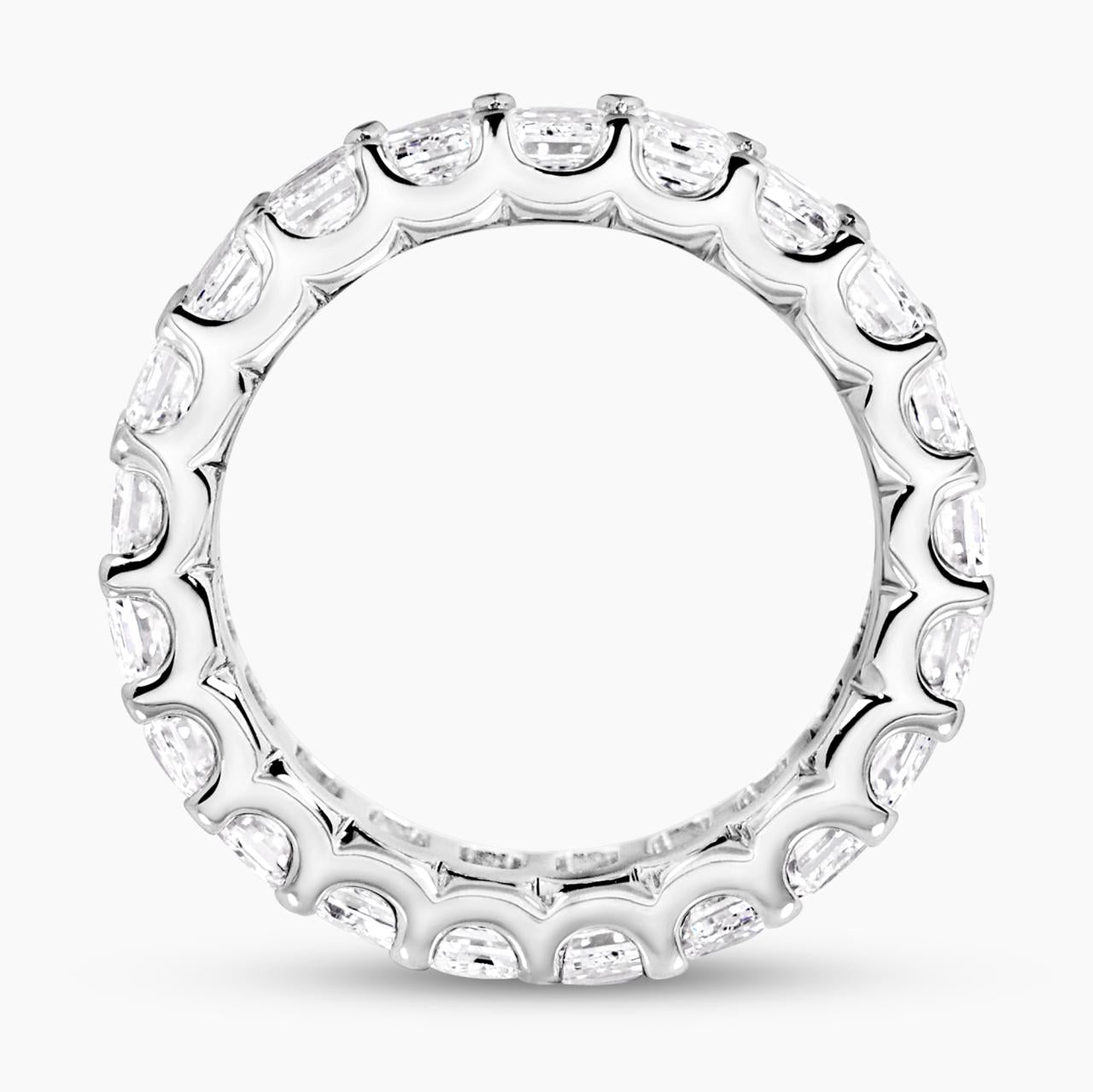 18ct white gold Emerald cut diamonds full circle ring in a claw setting side view