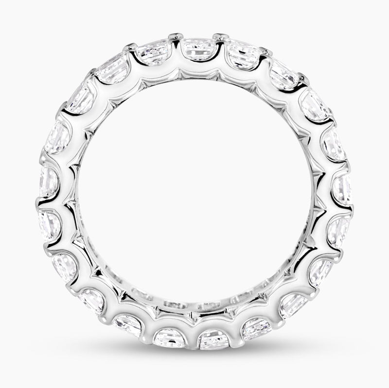18ct white gold Emerald cut diamonds full circle ring in a claw setting side view