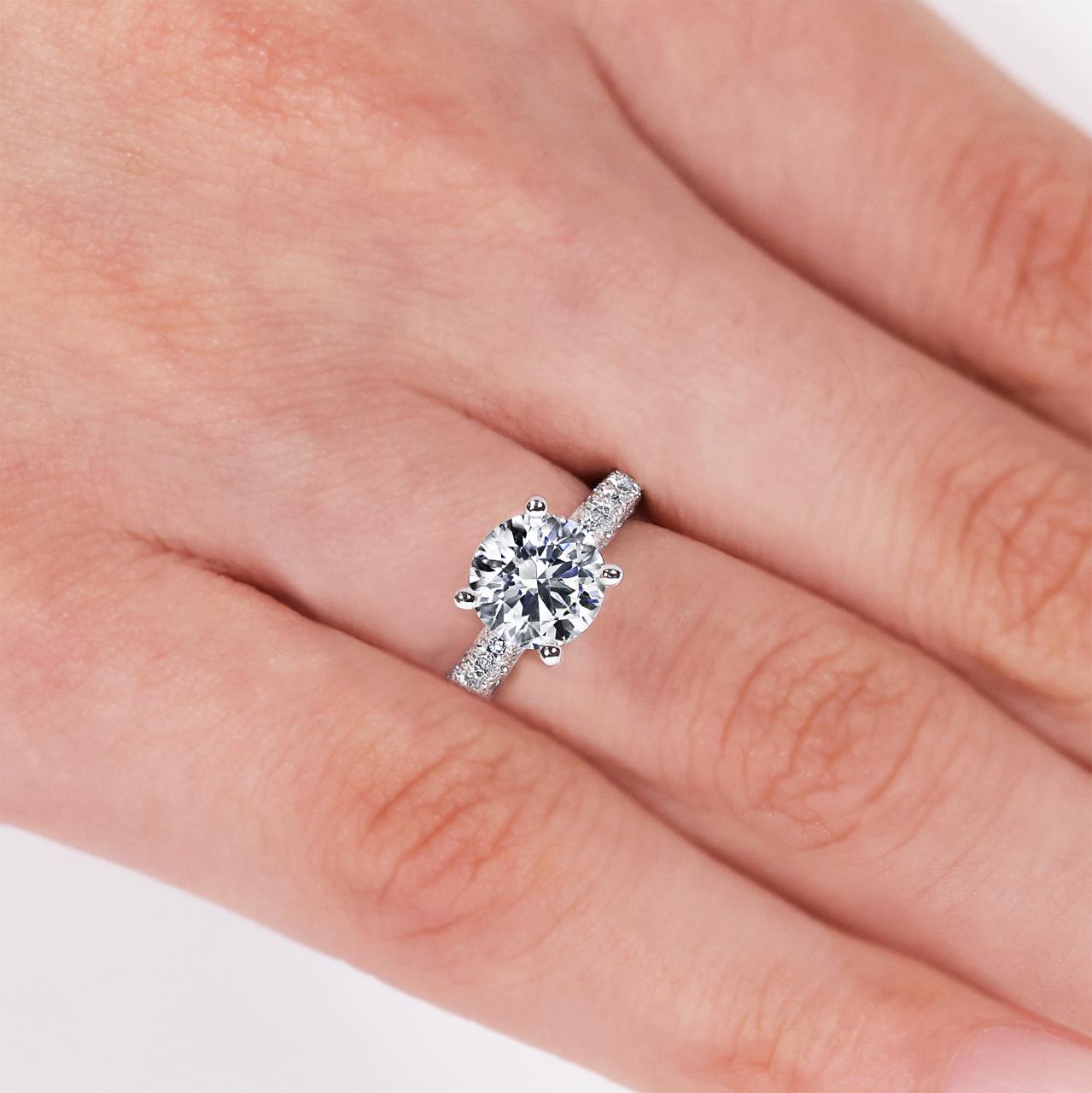 PROMESSA - 18ct white gold 1.21ct round brilliant cut diamond ring in a four claw setting