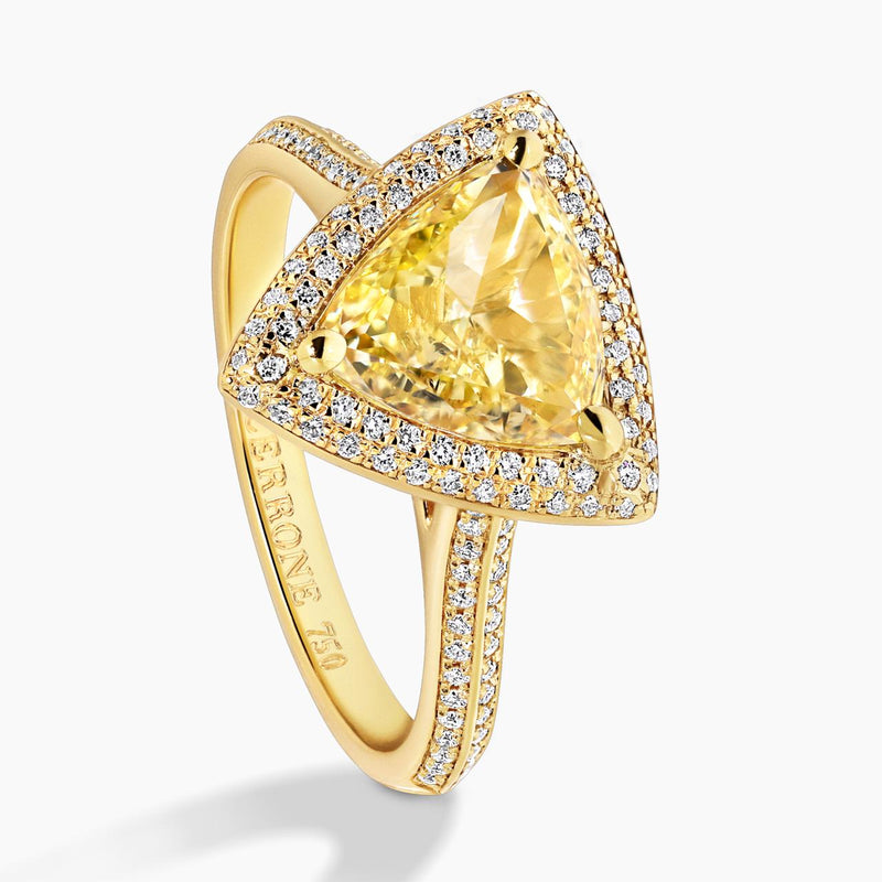 18ct yellow gold Fancy Yellow trilliant cut and round brilliant cut diamond halo ring