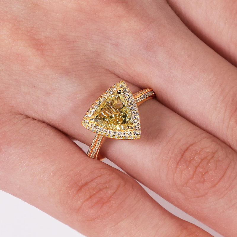 18ct yellow gold Fancy Yellow trilliant cut and round brilliant cut diamond halo ring