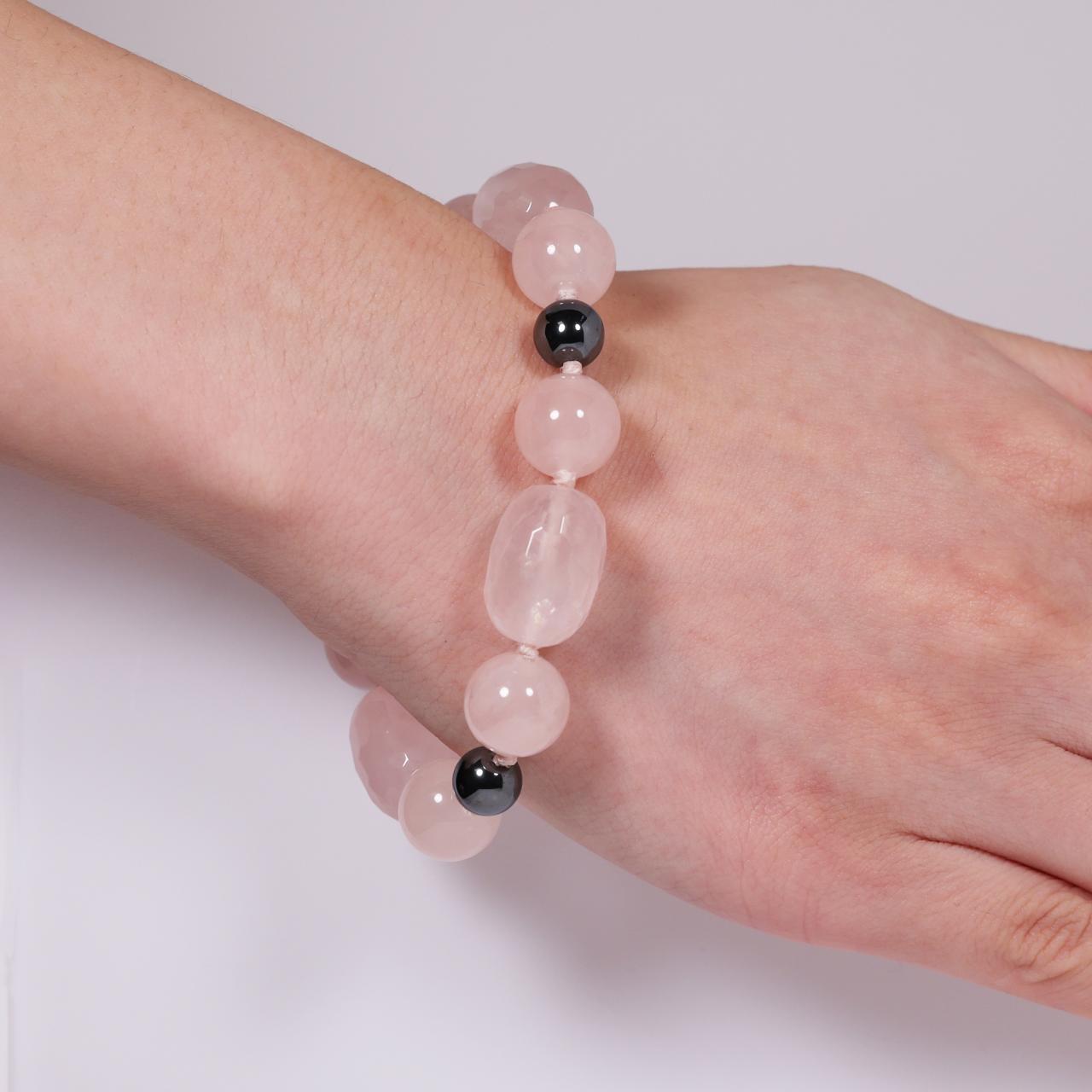 Hemitite and rose quartz bracelet from the Carmela Cerrone Collection on wrist