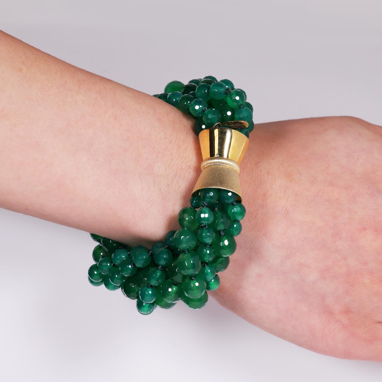 Green agate faceted beads 6 rows bracelet with a gold plated magnetic clasp from the Carmela Cerrone Collection on wrist
