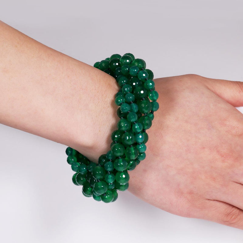 Green agate faceted beads 6 rows bracelet with a gold plated magnetic clasp from the Carmela Cerrone Collection on wrist