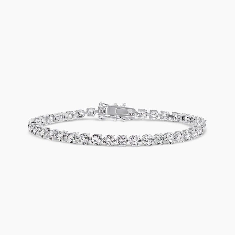 18ct white gold round brilliant cut lab grown diamonds tennis bracelet in a three claw setting