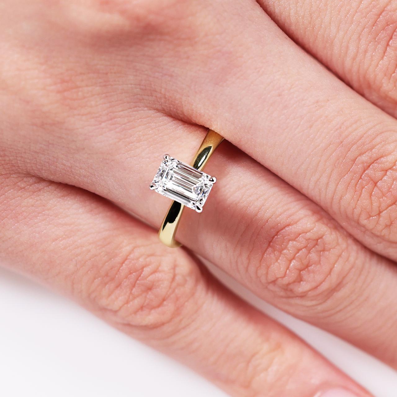 POSITANO-18ct yellow and white gold diamond solitaire engagement ring in a four claw setting. GIA Cert