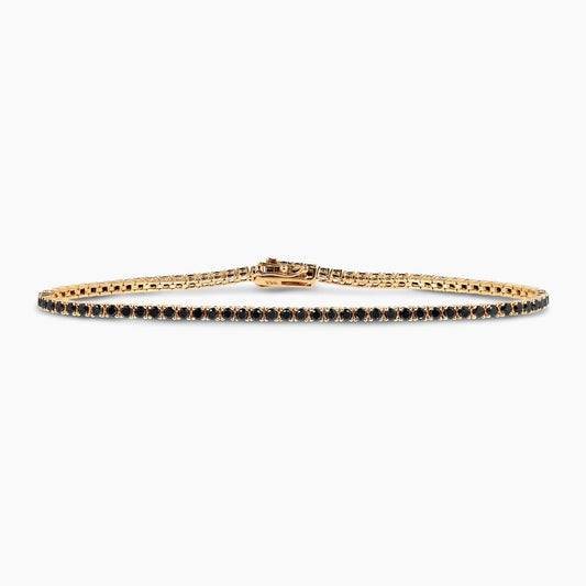 18ct yellow gold 84=3.15ct black round diamonds tennis bracelet in a four claw setting