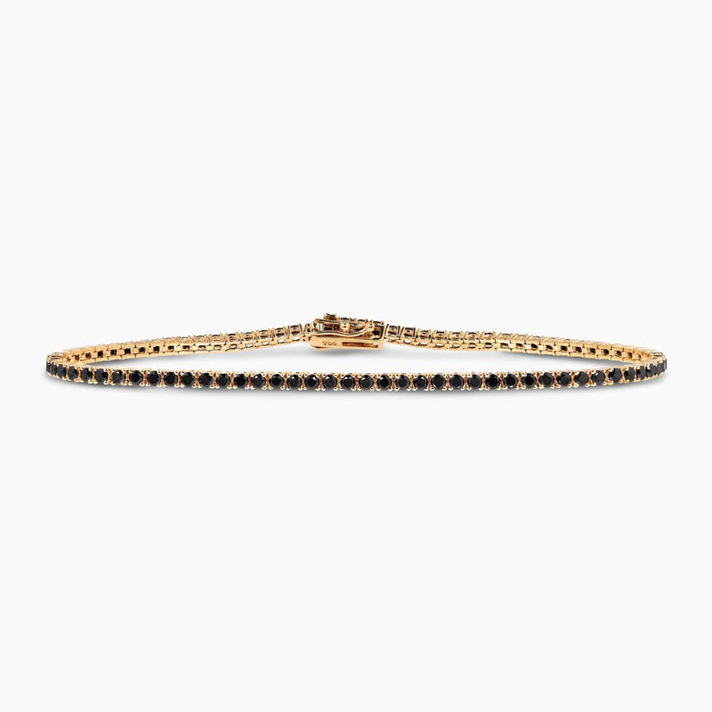 18ct yellow gold black round diamonds tennis bracelet in a four claw setting