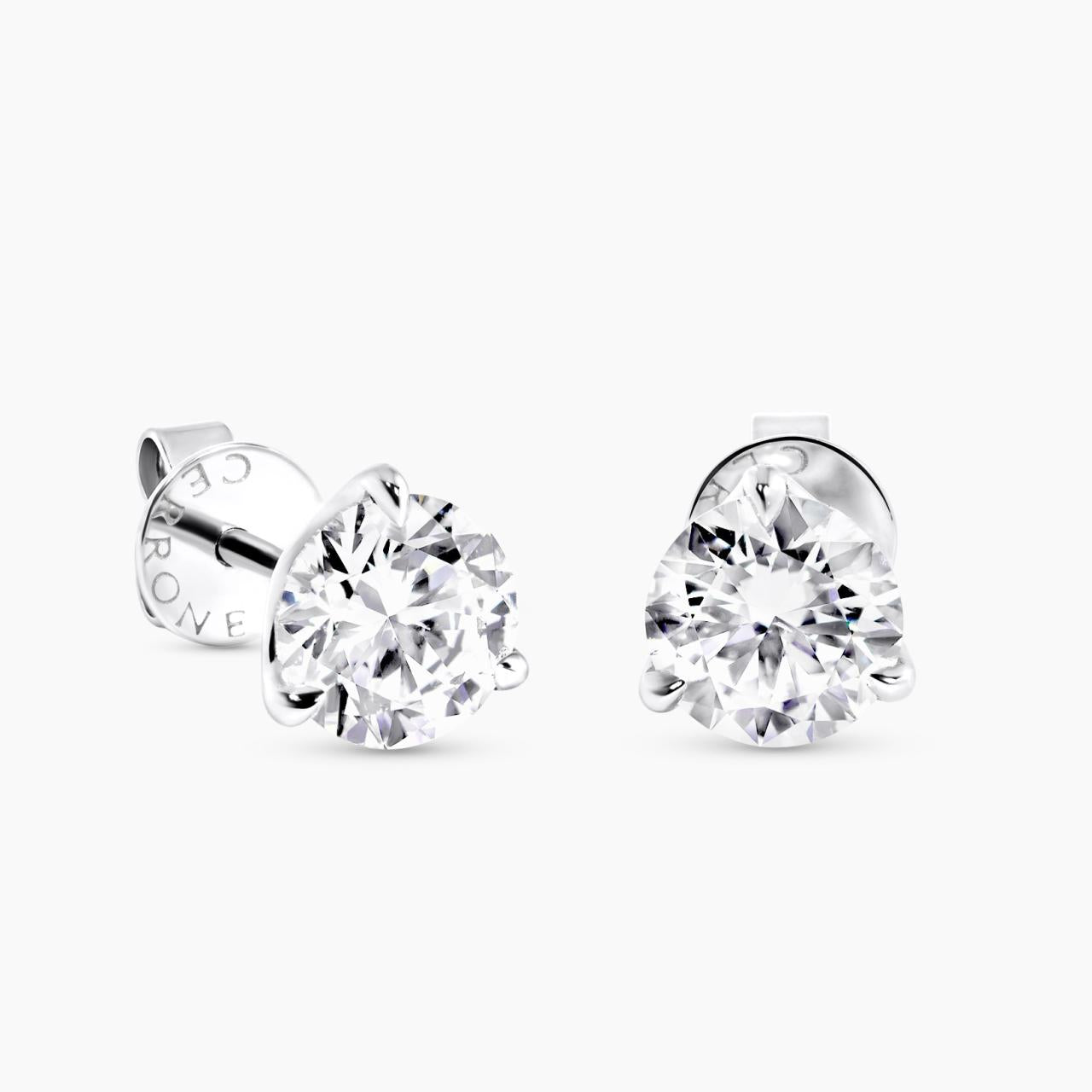 18ct white gold round brilliant cut solitaire diamond stud earrings in a three claw setting