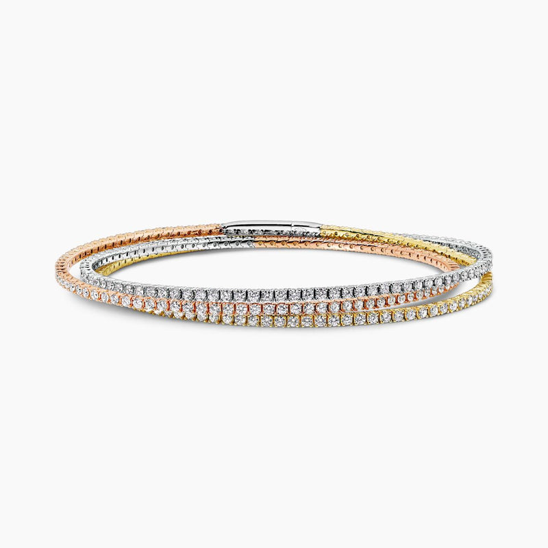 18ct rose, yellow and white gold three layered diamond claw set bangle