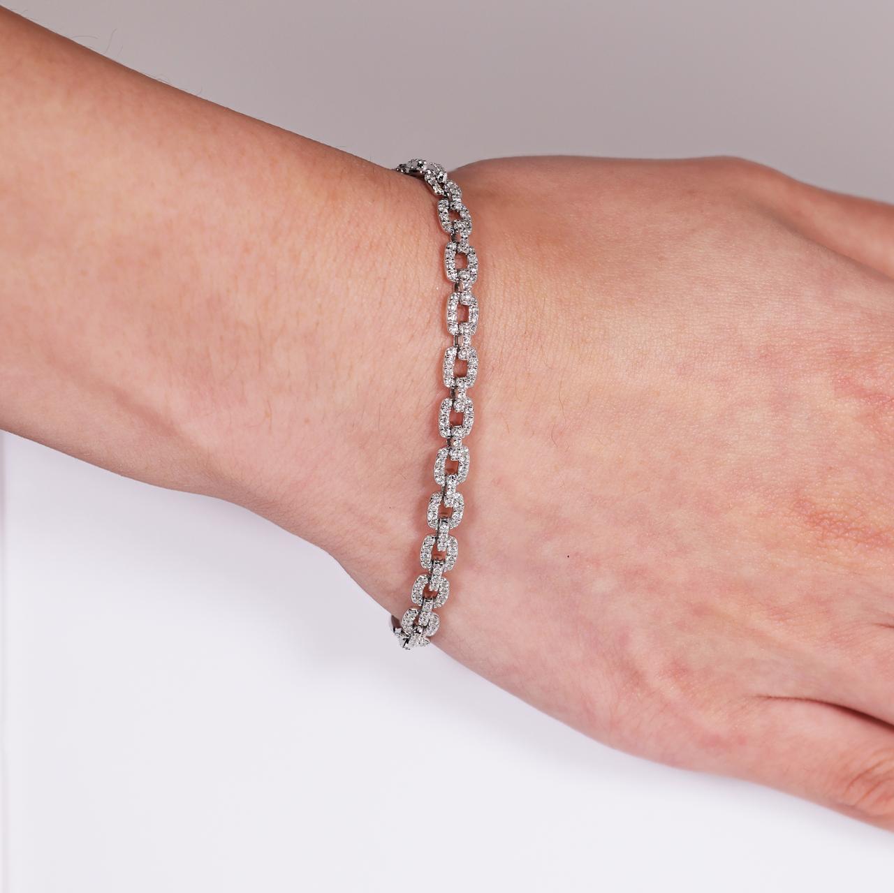 18ct white gold diamond pave set fancy link bracelet on the wrist