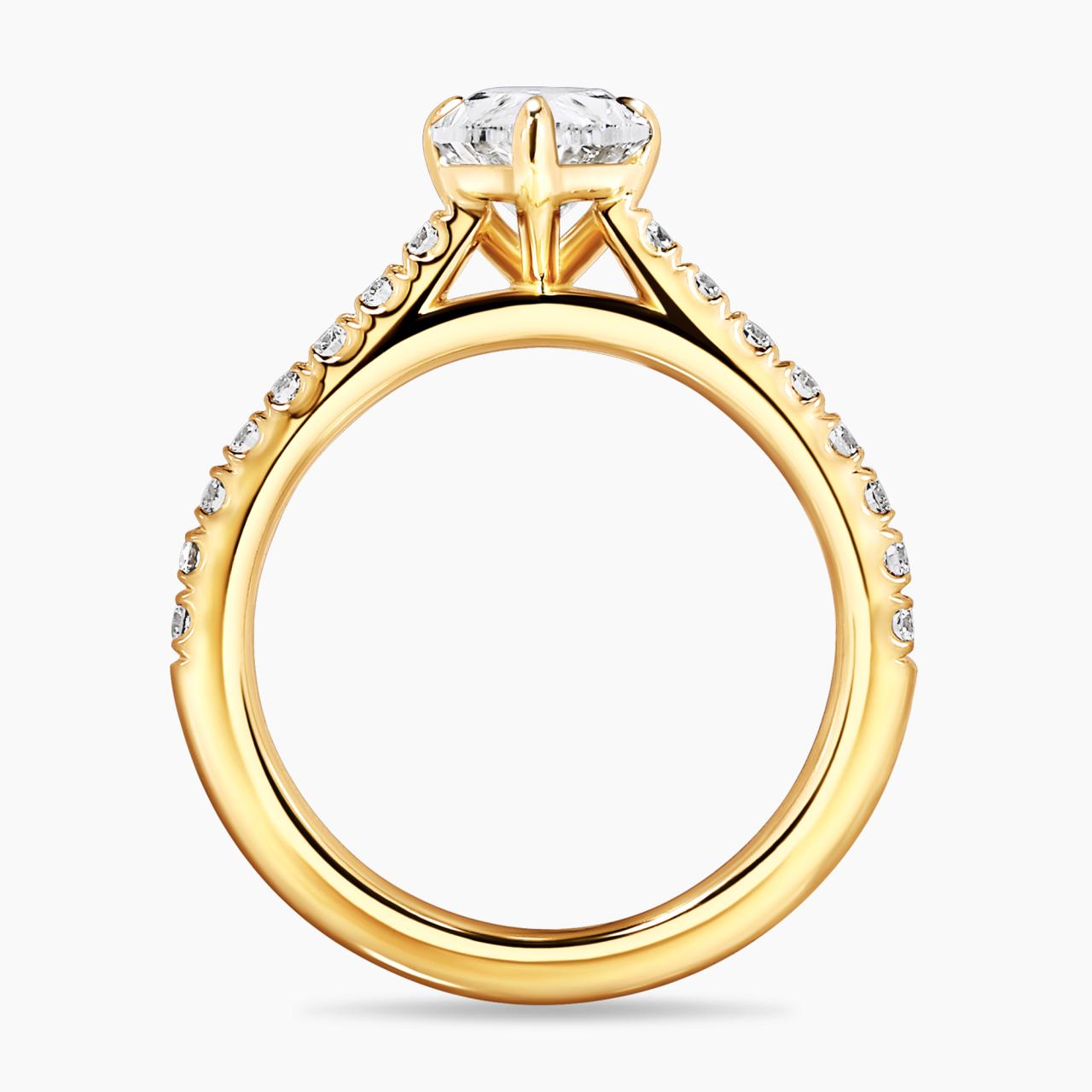 COMO - 18ct yellow gold pear shaped diamond engagement ring in a three claw setting with diamonds on the band. GIA Cert