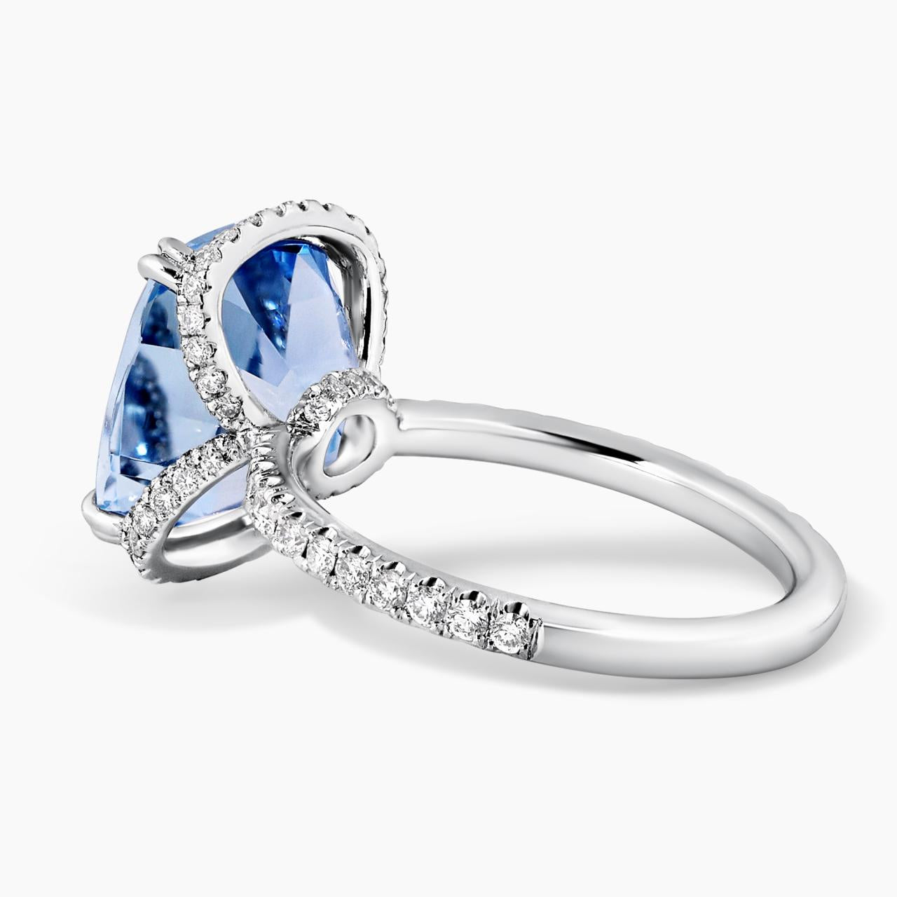 Platinum cushion cut Mozambique aquamarine and diamond ring