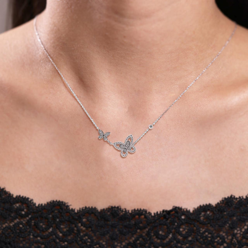 18ct white gold diamond butterfly necklace on the neck