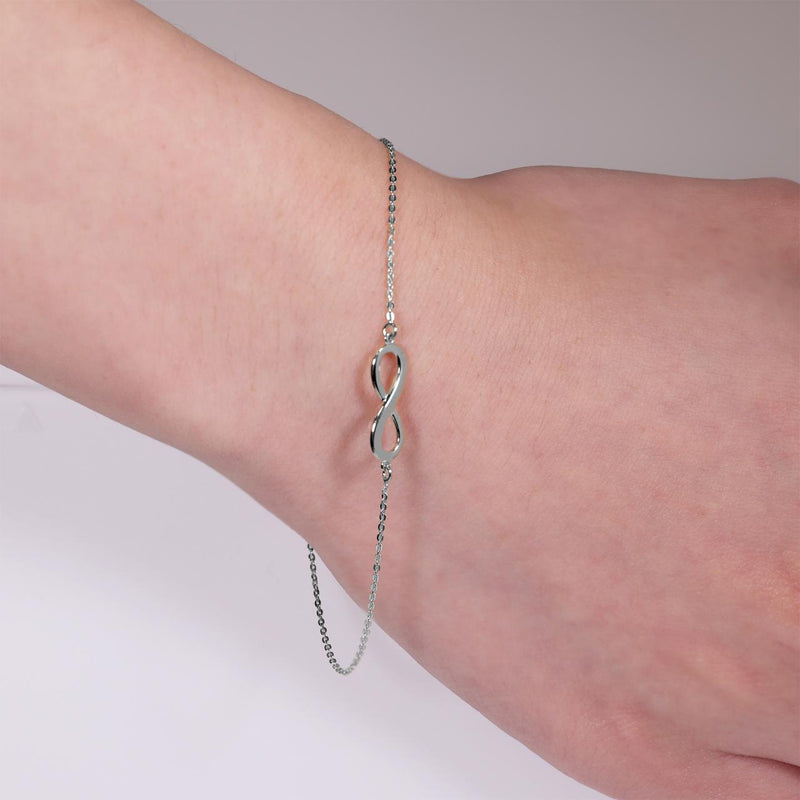 18ct white gold infinity bracelet with spring ring clasp on the wrist