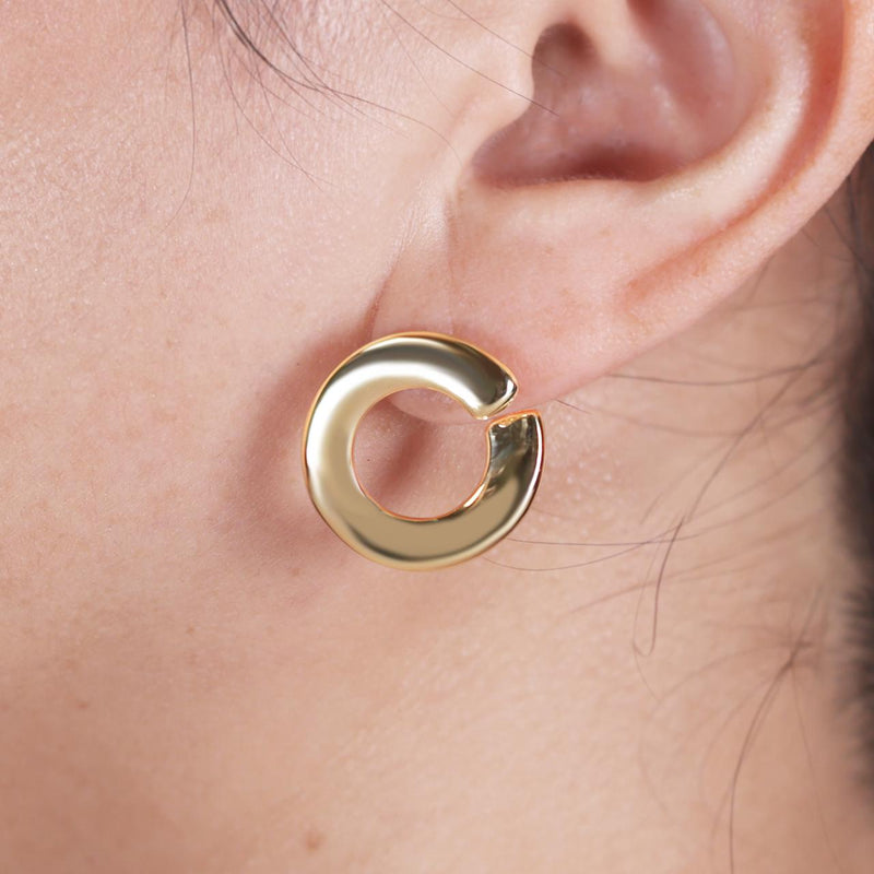 18ct yellow gold hollow chunky circle stud earrings on the ear