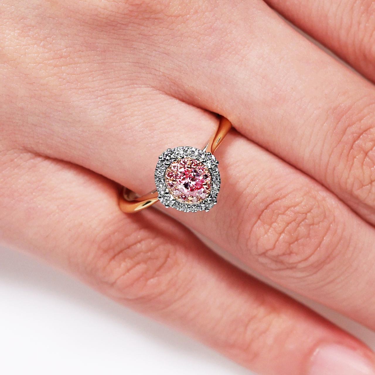 18ct rose and white gold oval shaped brilliant cut fancy intense purple pink diamond halo ring