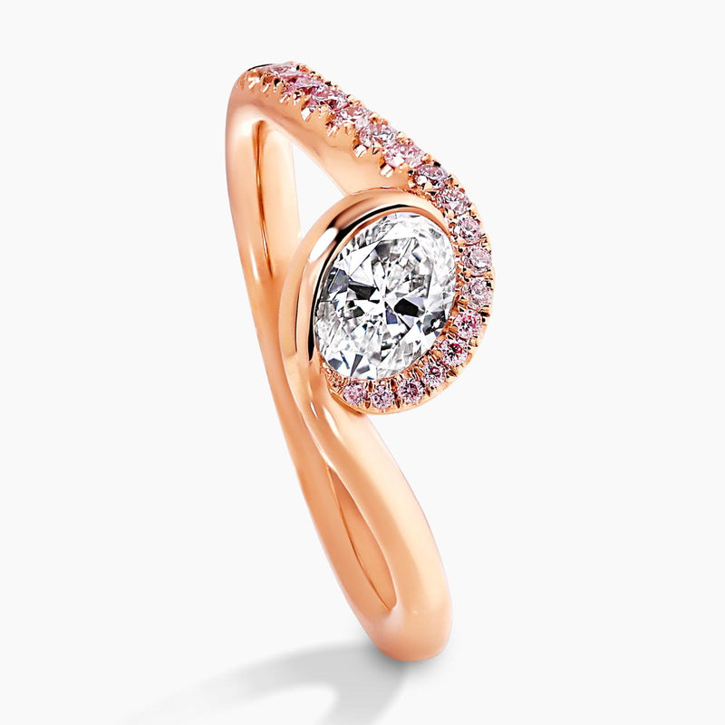 18ct rose gold oval brilliant cut diamond ring with Argyle RBC diamond band