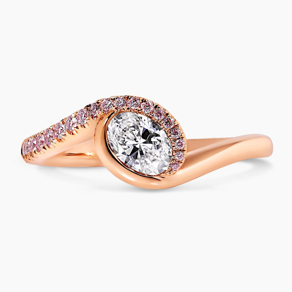 18ct rose gold oval brilliant cut diamond ring with Argyle RBC diamond band