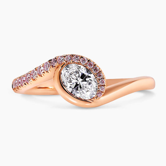 18ct rose gold oval brilliant cut diamond ring with Argyle RBC diamond band