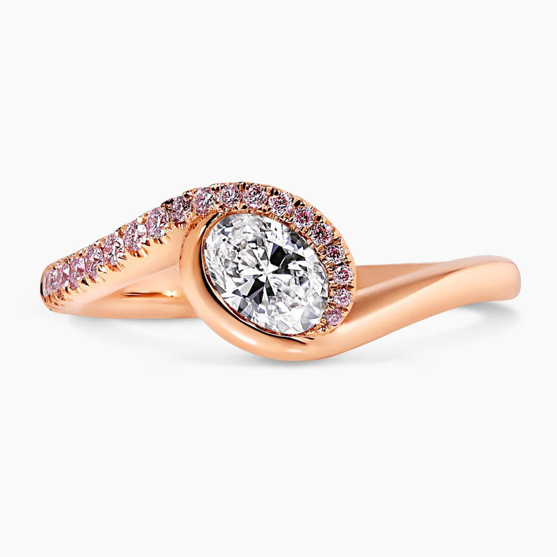 18ct rose gold oval brilliant cut diamond ring with Argyle RBC diamond band