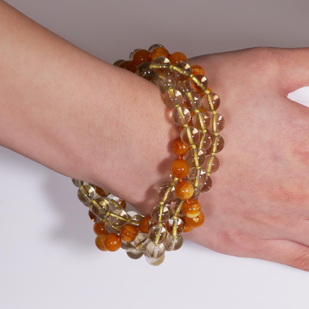 Amber and lemon quartz bracelet ended with a silver magnetic clasp from the Carmela Cerrone Collection on the wrist