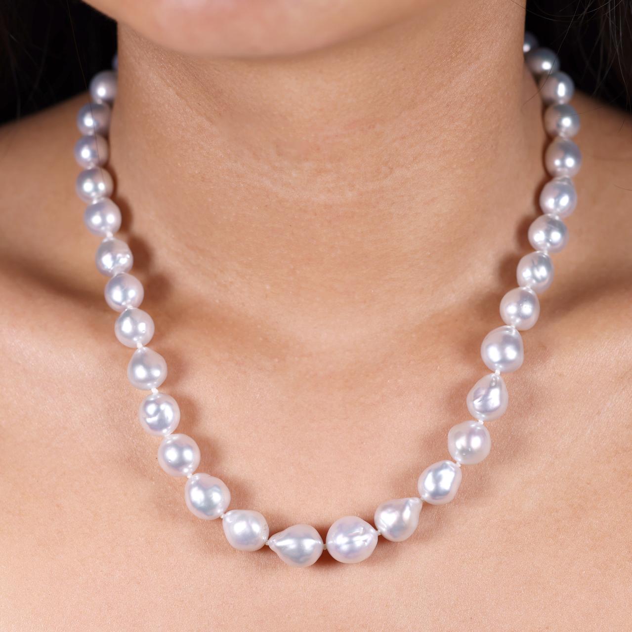 9-12mm South sea pearls necklace ended with a 18ct yellow gold diamond clasp from the Carmela Cerrone Collection on the neck