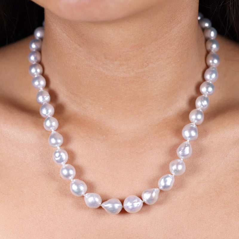 9-12mm South sea pearls necklace ended with a 18ct yellow gold diamond clasp from the Carmela Cerrone Collection on the neck