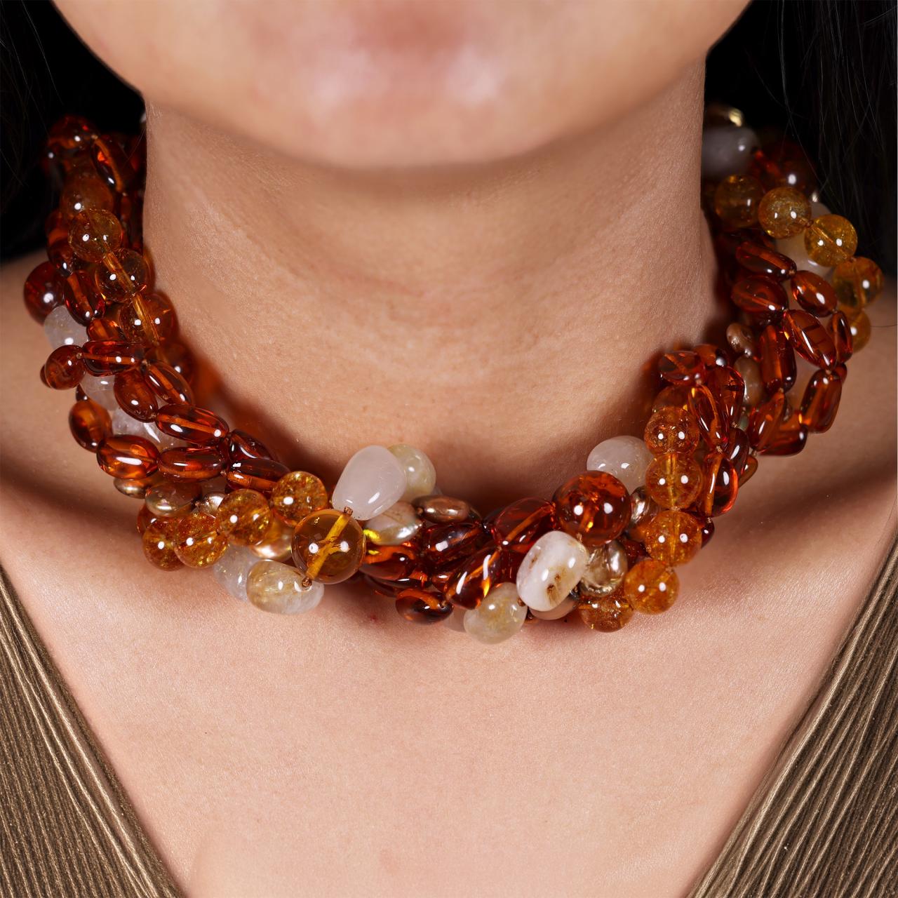 Peach colour coin fresh water pearls, yellow crystal  beads, with a mix of amber and gold plated hematite and golden rutile necklace ended with a gold plated silver magnetic clasp  on the neck