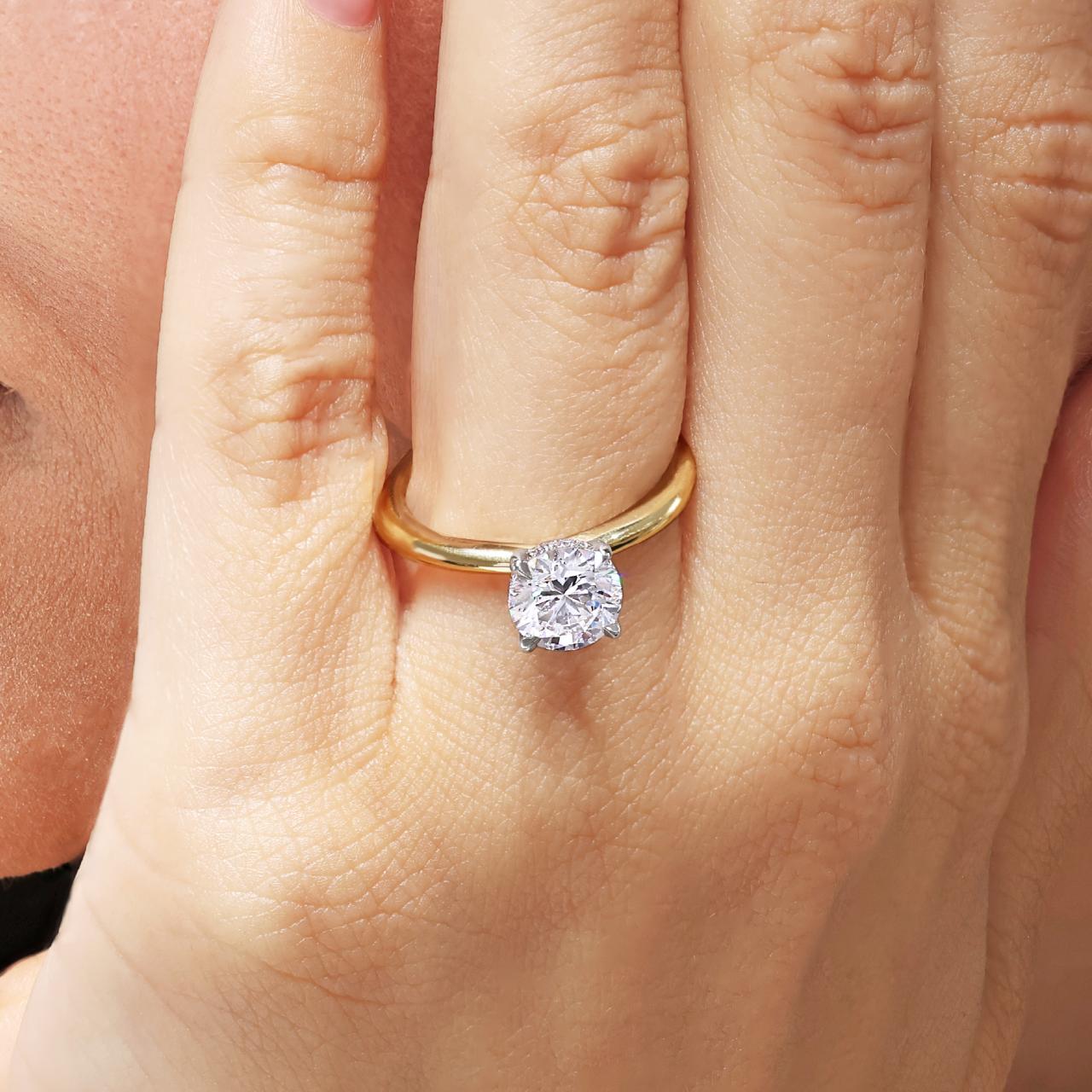 18ct yellow and white gold 1.40ct round brilliant cut diamond hidden halo ring