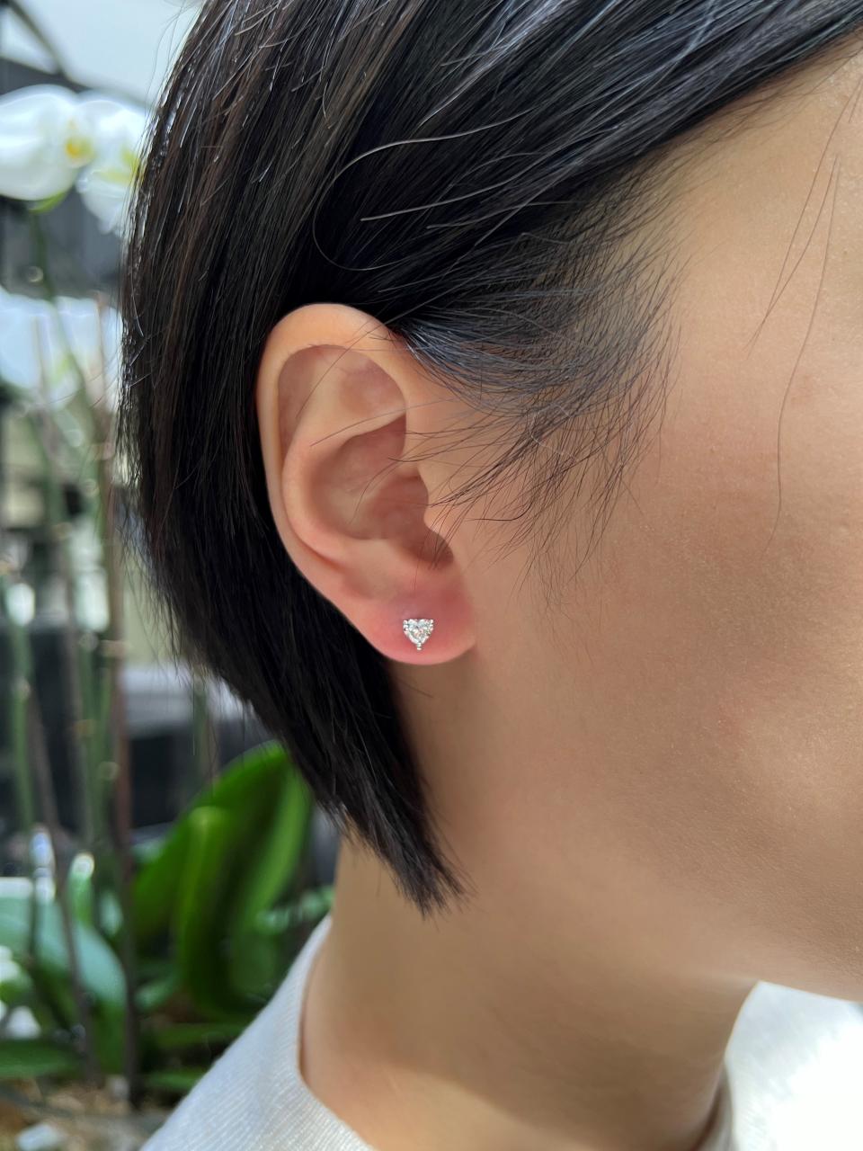 18ct white gold 2=0.62ct heart shaped diamond stud earrings in a claw setting