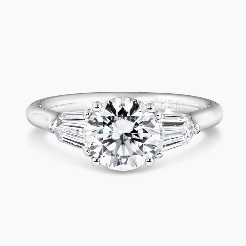 Platinum 1.50ct round brilliant cut diamond ring featuring 2=0.59ct bullet diamonds in a claw setting