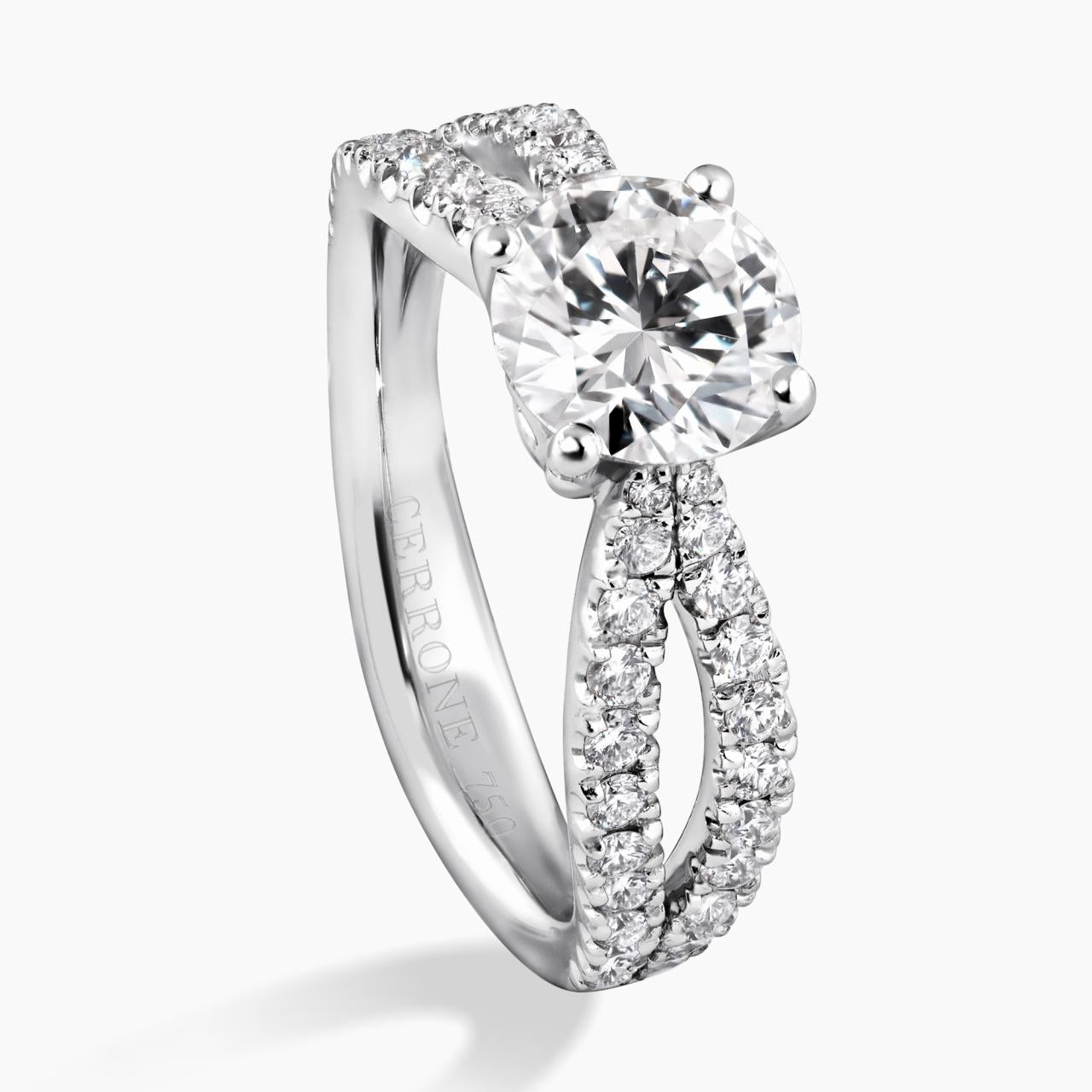 18ct white gold round brilliant cut diamond ring featuring round fancy pink diamonds side profile