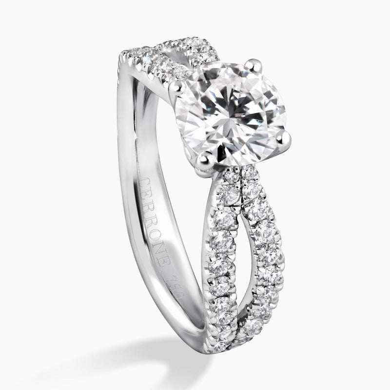 18ct white gold round brilliant cut diamond ring featuring round fancy pink diamonds side profile