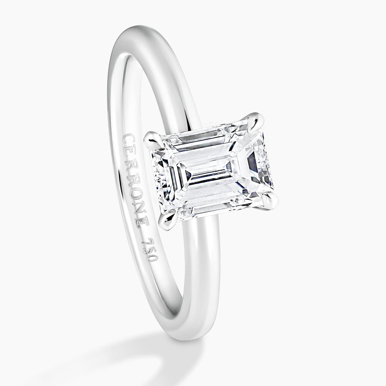 18ct white gold emerald cut diamond solitaire engagement ring in a four claw setting GIA Cert
